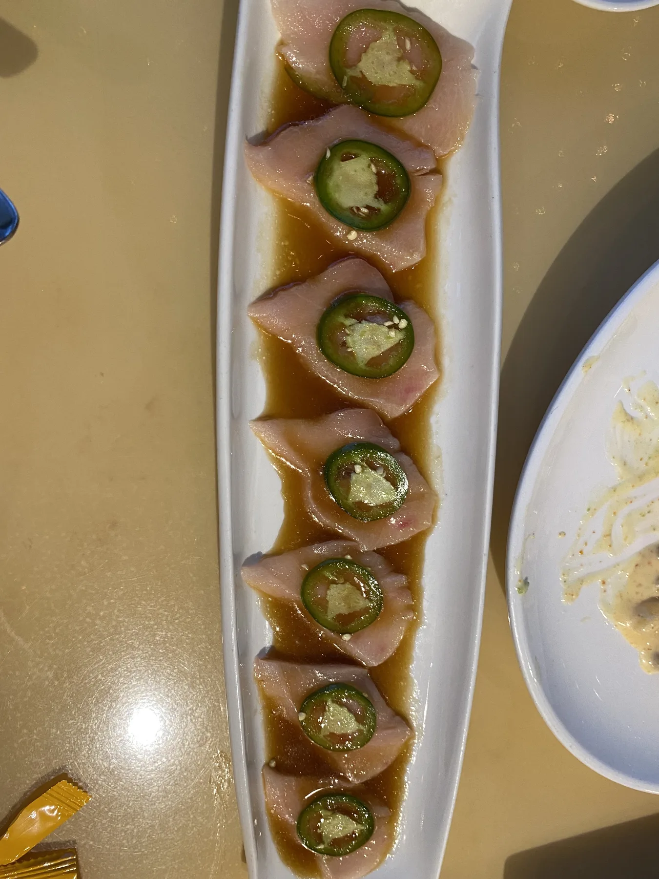 A composed dish and a cocktail at Hanami Restaurant