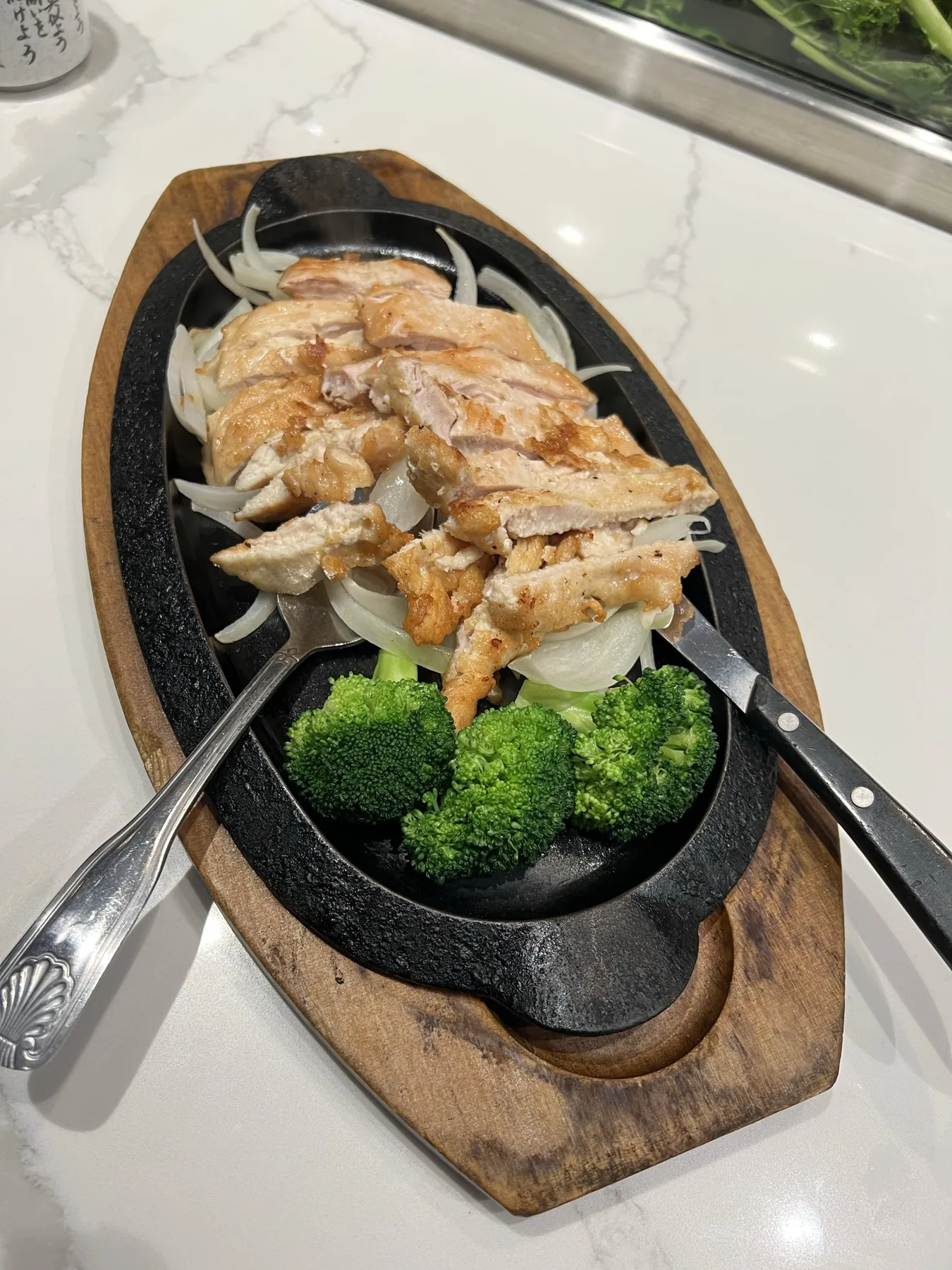 A sizzling hot plate dish served at Hanami Restaurant